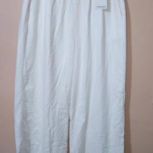 Pantalón Unicolor Con Pretina Resortada En Posterior, Bolsillos Laterales Y Ribetes Traseros
