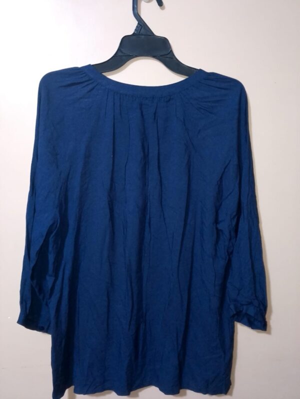 Blusa unicolor con manga 3/4