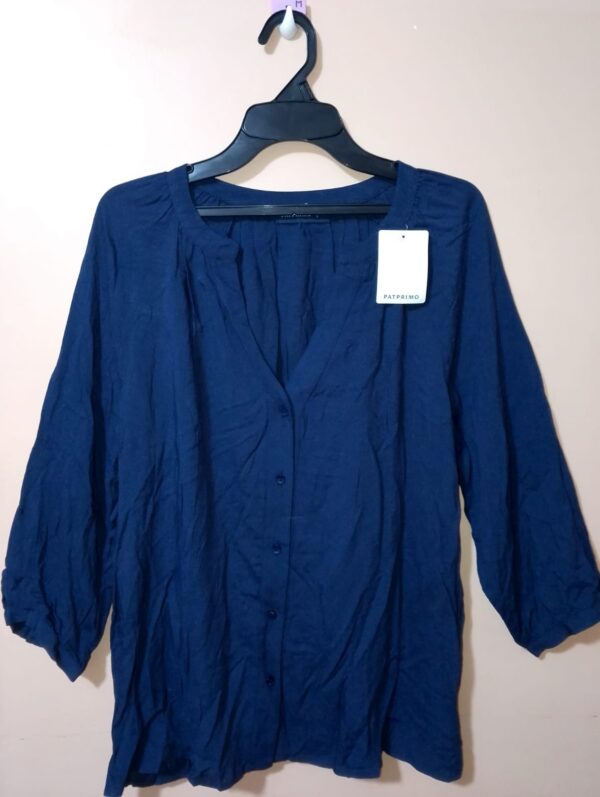 Blusa unicolor con manga 3/4