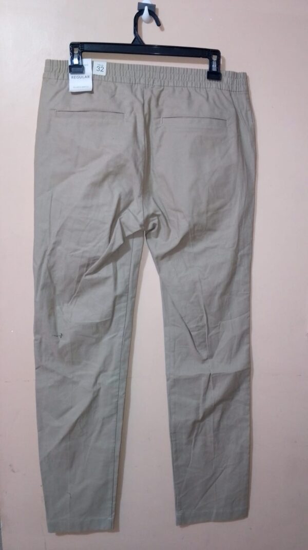 Pantalón Con Cintura Elástica Con Botón y Bolsillos Laterales, Bota Recta Y Silueta Regular Fit