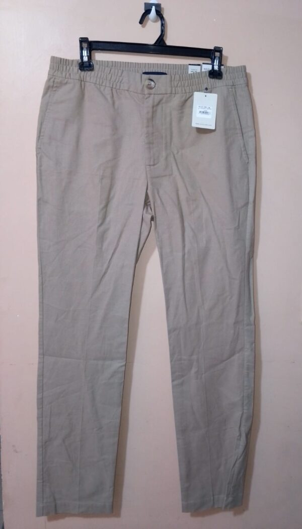 Pantalón Con Cintura Elástica Con Botón y Bolsillos Laterales, Bota Recta Y Silueta Regular Fit