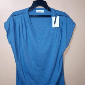 Camiseta para mujer, cuello en v, sin manga, silueta amplia, textura lisa