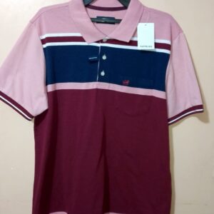 Polo para hombre, cuello tejido, manga corta, silueta regular, con bolsillo parche, estructura con bloques de colores en tonos que se combinan
