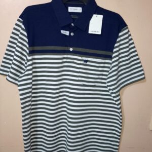 Polo para hombre, cuello maquina, manga corta, silueta regular, bolsillo de parche, estructura de bloques