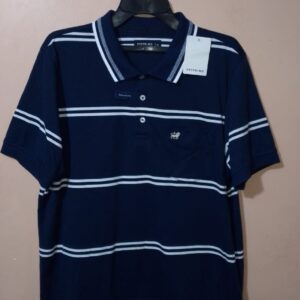 Polo para hombre, cuello tejido, manga corta, silueta regular, con bolsillo parche, estructura con bloques de colores en tonos que se combinan